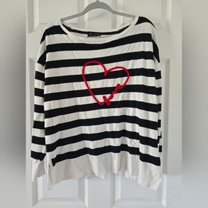 Black and white sweater with cute heart in size L